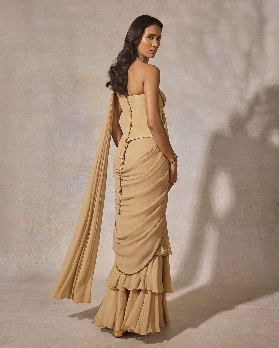 Beige Ruffle Saree with Corset Blouse